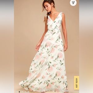 Lulus white floral dress with peach colored and green flowers. Size Medium